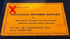 This image shows a card or label with the words “Geological specimen supplies” printed on it.