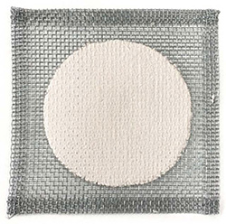 This image shows a grey square made of woven mesh with a white painted circle in the centre